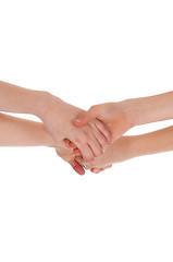 Image showing Two hands joining together.