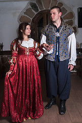 Image showing Pretty couple in medieval era costumes