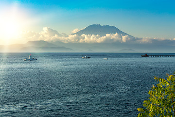 Image showing view on Bali from ocean, vulcano in clouds