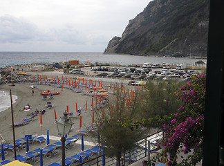 Image showing editorial beach in Monterosso Cinque Terre Italy with tourists a