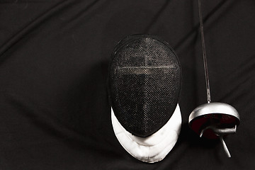 Image showing The fencing mask and rapier 