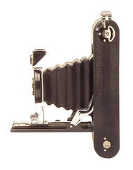 Image showing Vintage folding bellows roll film camera in profile