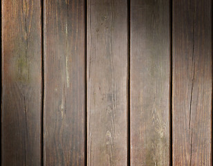 Image showing Weathered wooden plank background lit diagonally