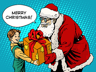 Image showing Merry Christmas Santa Claus gift gives the child