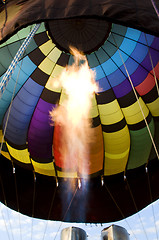 Image showing Flames from a burner inside a hot-air balloon envelop