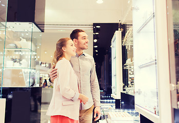 Image showing couple looking to shopping window at jewelry store