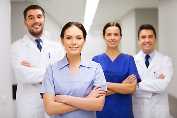 Image showing happy group of medics or doctors at hospital