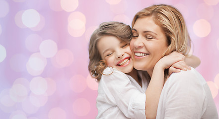 Image showing happy mother and daughter hugging