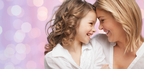 Image showing happy mother and daughter hugging