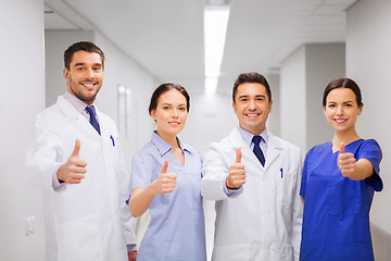 Image showing medics or doctors at hospital showing thumbs up