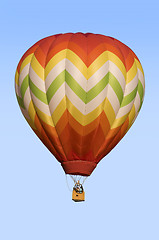 Image showing Hot-Air Balloon Floating Against Blue Sky