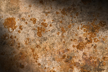 Image showing Metal background with rusty corrosion lit diagonally