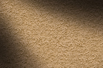 Image showing Stucco wall texture lit diagonally
