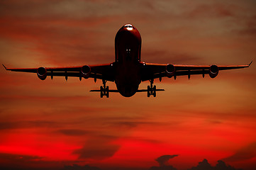 Image showing Air travel - Silhouett of plane and sunset