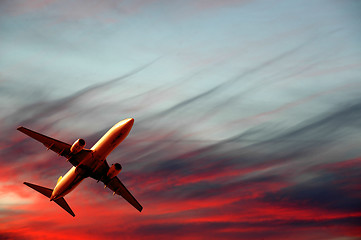 Image showing Air travel - plane and sunset