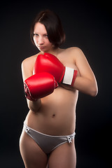 Image showing beautiful nude girl with boxing gloves