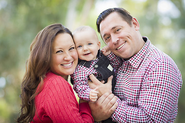 Image showing Little Baby Boy Having Fun With Mother and Father Outdoors