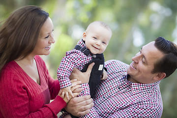 Image showing Little Baby Boy Having Fun With Mother and Father Outdoors