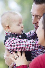 Image showing Little Baby Boy Having Fun With Mother and Father Outdoors