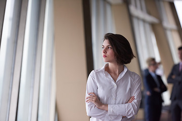 Image showing business people group, woman in front  as team leader