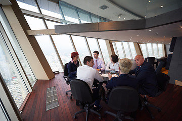 Image showing business people group on meeting at modern bright office