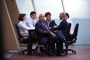 Image showing business people group on meeting at modern bright office