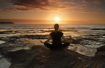 Image showing Meditating or yoga by the sea