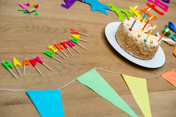 Image showing Birthday Cake And Decorations On Table