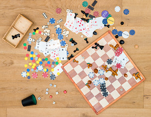 Image showing Various Leisure Games Spread On Wooden Table