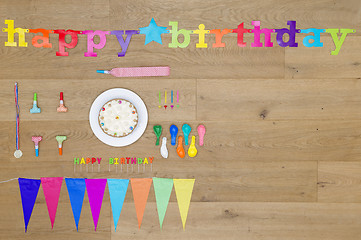 Image showing Birthday Decorations On Wooden Table