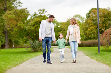 Image showing happy family walking in summer park