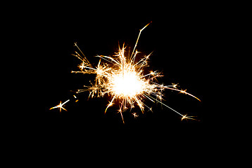 Image showing sparkler or bengal light burning over black