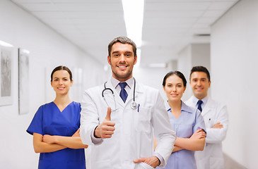 Image showing medics or doctors at hospital showing thumbs up