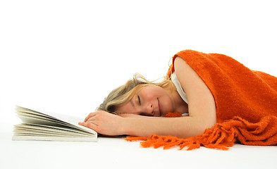 Image showing Girl fallen asleep with a book