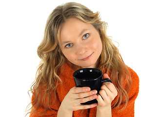 Image showing Charming girl with a big cup of tea
