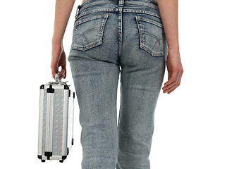 Image showing Woman in blue jeans with metal case