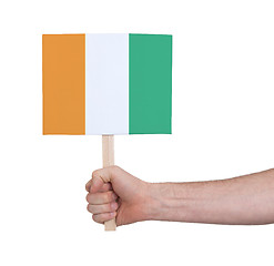 Image showing Hand holding small card - Flag of Ivory Coast