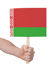 Image showing Hand holding small card - Flag of Belarus