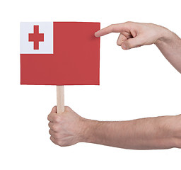 Image showing Hand holding small card - Flag of Tonga