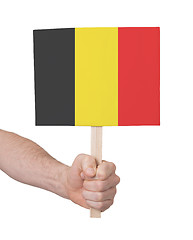 Image showing Hand holding small card - Flag of Belgium