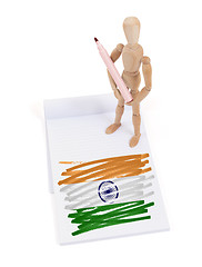 Image showing Wooden mannequin made a drawing - India