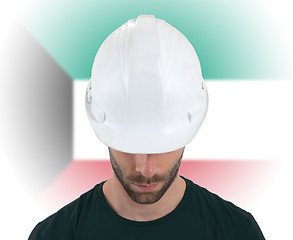 Image showing Engineer with flag on background - Kuwait