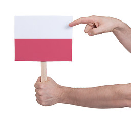 Image showing Hand holding small card - Flag of Poland