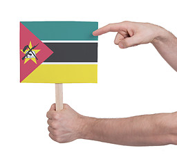 Image showing Hand holding small card - Flag of Mozambique