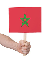 Image showing Hand holding small card - Flag of Morocco