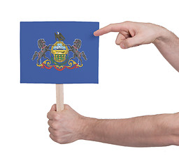 Image showing Hand holding small card - Flag of Pennsylvania