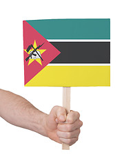 Image showing Hand holding small card - Flag of Mozambique