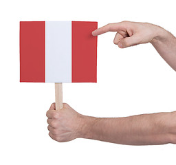 Image showing Hand holding small card - Flag of Peru