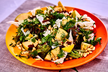 Image showing Salad with pears, nuts and greens