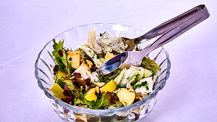 Image showing Salad with pears, nuts and greens